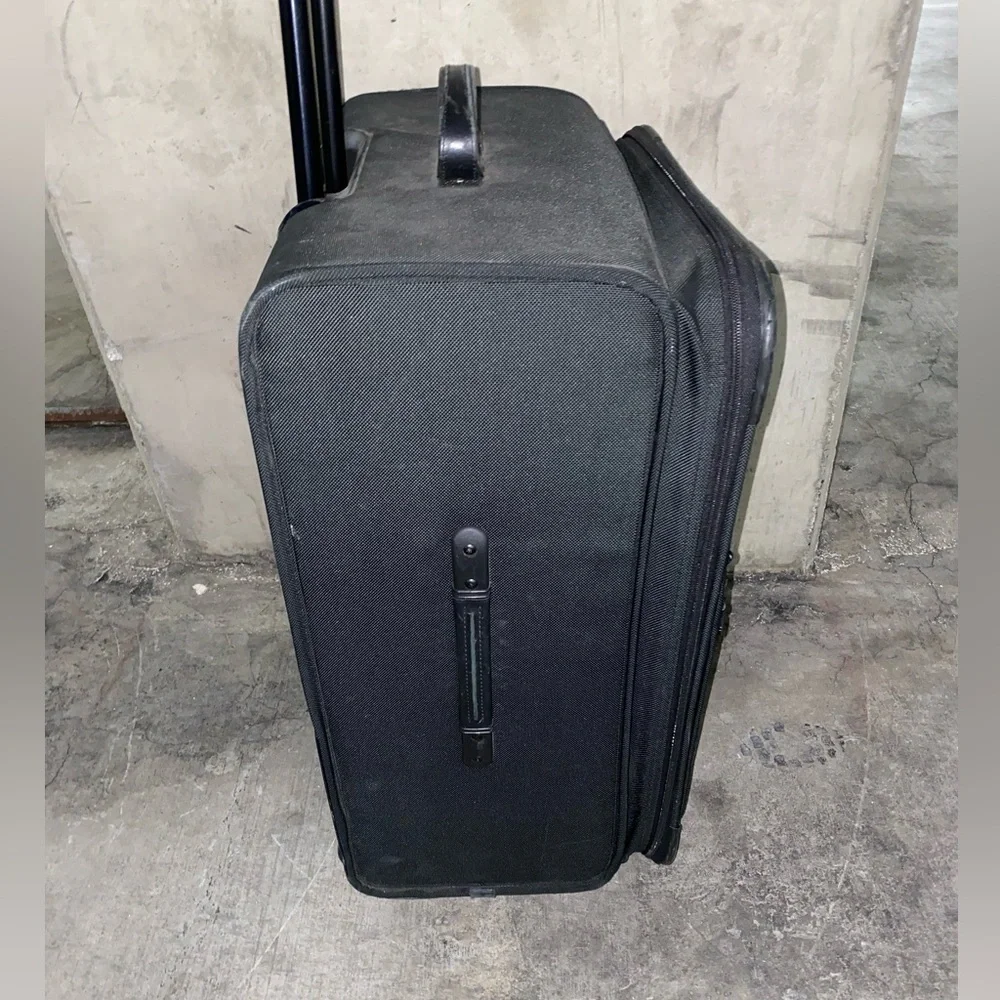 TUMI Check On Suitcase